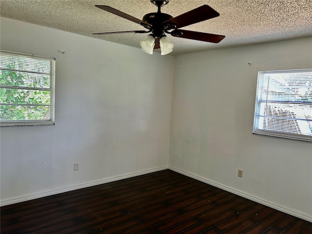 304 Bell St, Wauchula, FL 33873 - empty room with wood finished floors, a textured ceiling, a ceiling fan, and baseboards