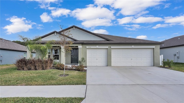 2966 Flying Blackbird Rd, Bartow, FL 33830 - ranch-style house featuring stucco siding, concrete driveway, a garage, and a front lawn