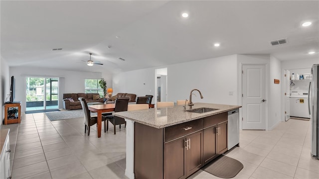 2966 Flying Blackbird Rd, Bartow, FL 33830 - kitchen featuring dishwasher, a sink, lofted ceiling, recessed lighting, and light tile patterned floors