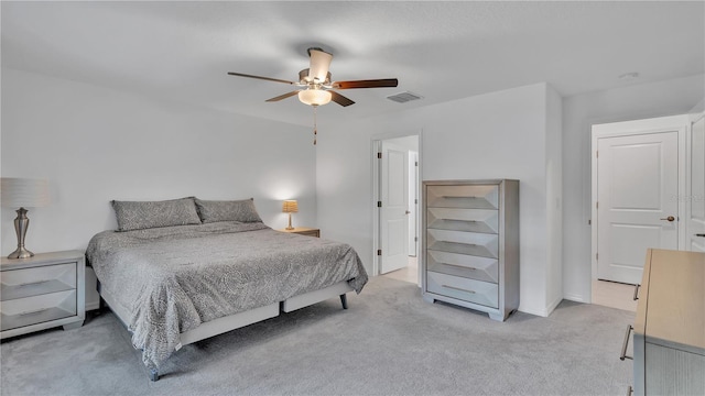 2966 Flying Blackbird Rd, Bartow, FL 33830 - bedroom with light colored carpet, ceiling fan, and baseboards