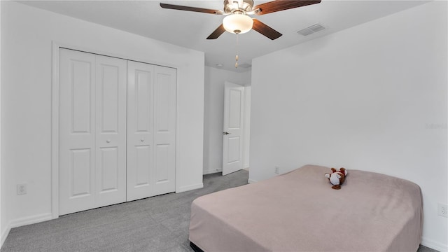 2966 Flying Blackbird Rd, Bartow, FL 33830 - carpeted bedroom featuring baseboards, a ceiling fan, and a closet