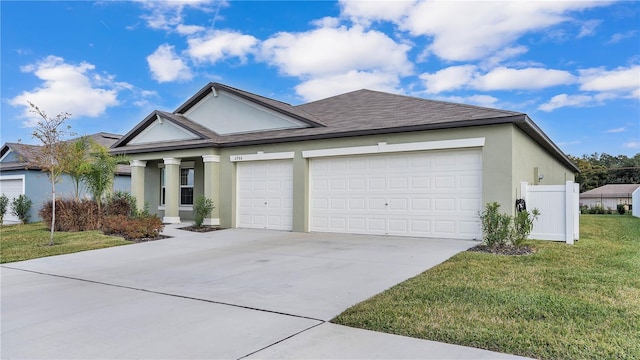 2966 Flying Blackbird Rd, Bartow, FL 33830 - ranch-style house featuring stucco siding, driveway, a garage, a front lawn, and roof with shingles