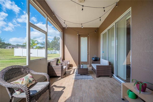 6339 Alamanda Hills Dr, Lakeland, FL 33813 - sunroom / solarium featuring an outdoor living space