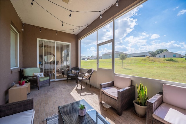 6339 Alamanda Hills Dr, Lakeland, FL 33813 - sunroom / solarium featuring an outdoor hangout area