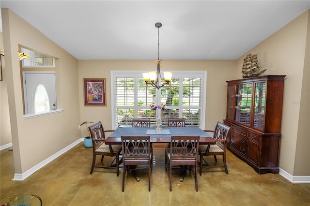 1130 Ewell Rd, Lakeland, FL 33811 - dining space with a chandelier and baseboards