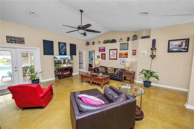 1130 Ewell Rd, Lakeland, FL 33811 - living room with french doors, a ceiling fan, finished concrete flooring, lofted ceiling, and baseboards