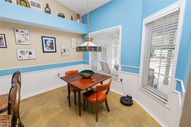 1130 Ewell Rd, Lakeland, FL 33811 - dining room featuring concrete floors and plenty of natural light