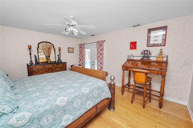 1130 Ewell Rd, Lakeland, FL 33811 - bedroom featuring light wood-style flooring, baseboards, and a ceiling fan