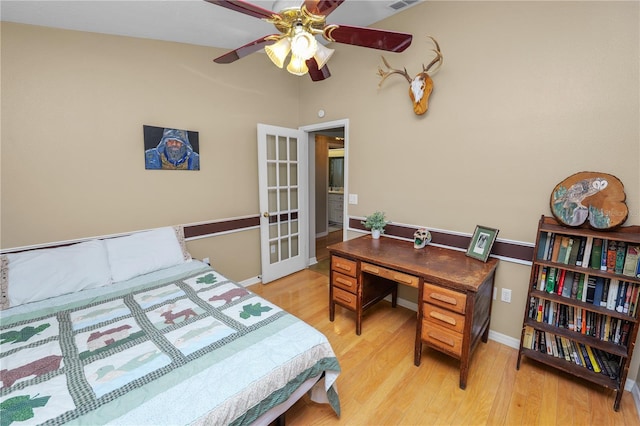 1130 Ewell Rd, Lakeland, FL 33811 - bedroom featuring light wood-style flooring and baseboards
