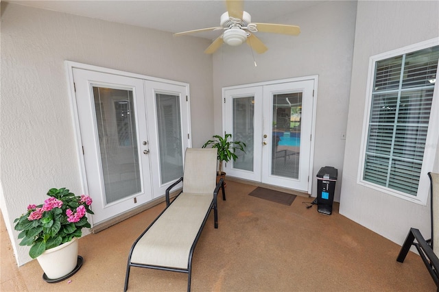 1130 Ewell Rd, Lakeland, FL 33811 - property entrance featuring french doors, a patio area, stucco siding, and ceiling fan