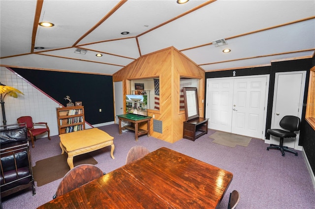 1130 Ewell Rd, Lakeland, FL 33811 - carpeted living area featuring vaulted ceiling, recessed lighting, baseboards, wooden walls, and an accent wall