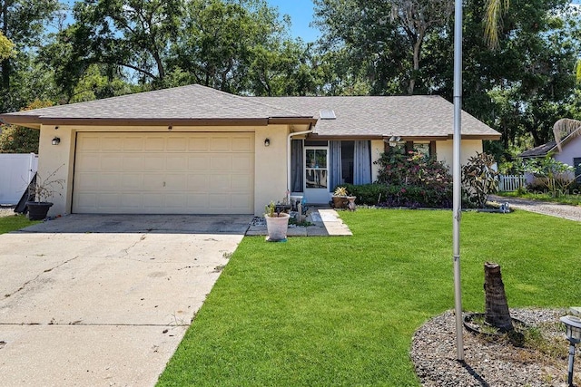 13411 Whitby Rd, Hudson, FL 34667 - ranch-style house with stucco siding, an attached garage, concrete driveway, and a shingled roof