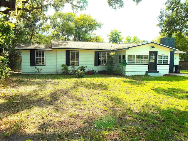 4629 Harden Blvd, Lakeland, FL 33813 - ranch-style house featuring a chimney