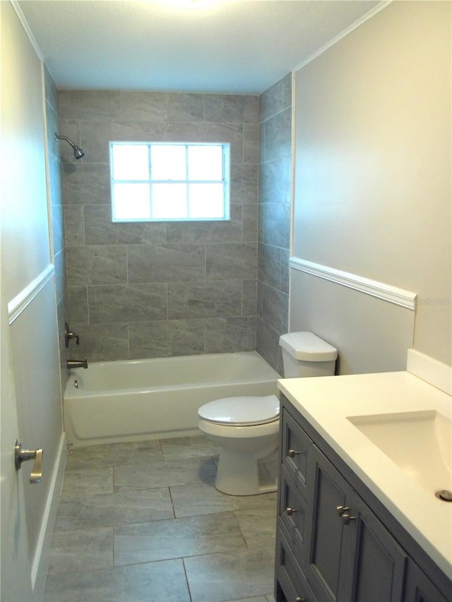 4629 Harden Blvd, Lakeland, FL 33813 - full bath featuring vanity, toilet, bathing tub / shower combination, and ornamental molding