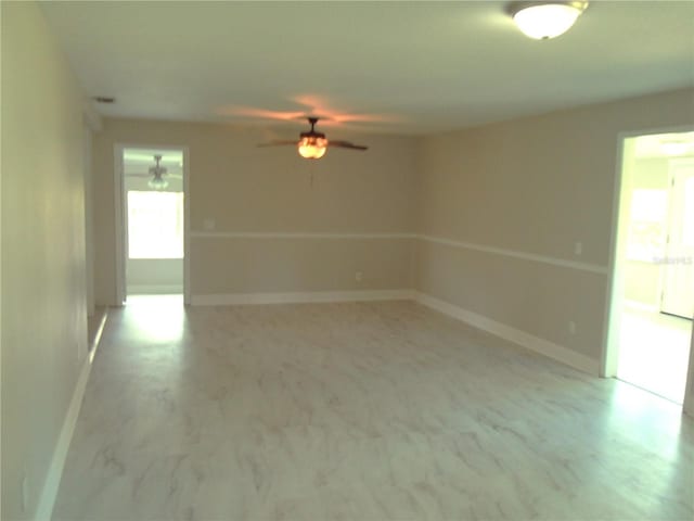4629 Harden Blvd, Lakeland, FL 33813 - unfurnished room with a ceiling fan and baseboards