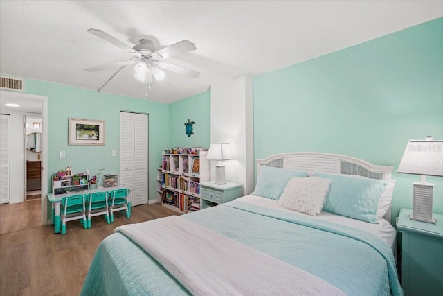830 N Atlantic Ave Unit B502, Cocoa Beach, FL 32931 - bedroom featuring wood finished floors, a closet, and ceiling fan