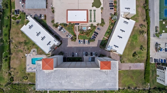 830 N Atlantic Ave Unit B502, Cocoa Beach, FL 32931 - drone / aerial view of a pool area