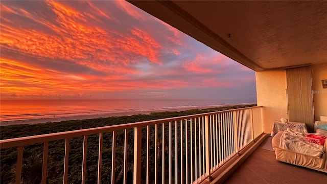 830 N Atlantic Ave Unit B502, Cocoa Beach, FL 32931 - balcony at dusk featuring view of water and beach
