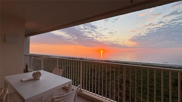 830 N Atlantic Ave Unit B502, Cocoa Beach, FL 32931 - balcony featuring view of water and beach and outdoor dining area
