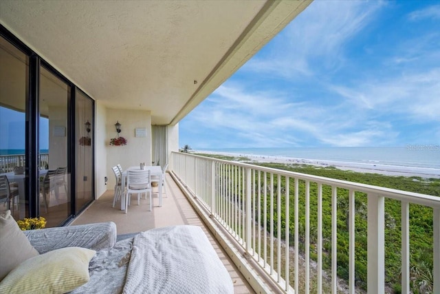 830 N Atlantic Ave Unit B502, Cocoa Beach, FL 32931 - balcony featuring view of water and beach