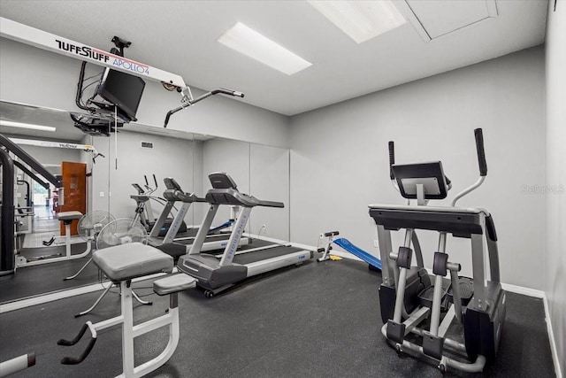 830 N Atlantic Ave Unit B502, Cocoa Beach, FL 32931 - workout area with baseboards