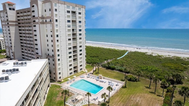 830 N Atlantic Ave Unit B502, Cocoa Beach, FL 32931 - drone / aerial view of apartment complex, unending shoreline, and a pool