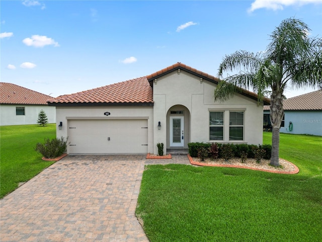 4125 Prima Lago Cir, Lakeland, FL 33810 - mediterranean / spanish-style home with stucco siding, a garage, and a front lawn