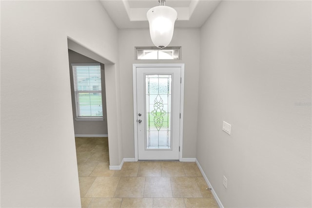 4125 Prima Lago Cir, Lakeland, FL 33810 - foyer featuring baseboards and a tray ceiling
