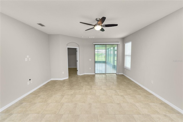 4125 Prima Lago Cir, Lakeland, FL 33810 - unfurnished room with a ceiling fan and baseboards