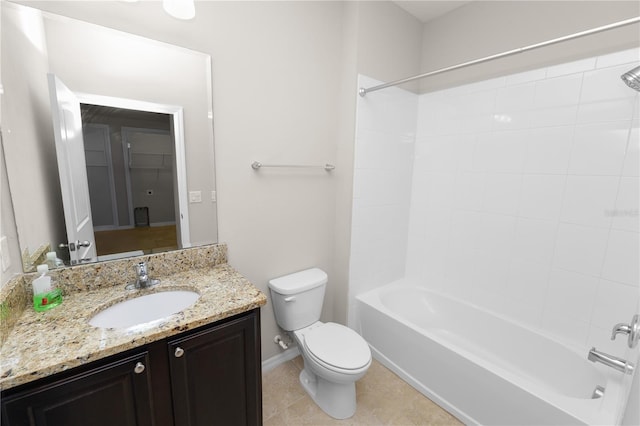 4125 Prima Lago Cir, Lakeland, FL 33810 - bathroom with toilet, vanity, bathing tub / shower combination, tile patterned flooring, and baseboards