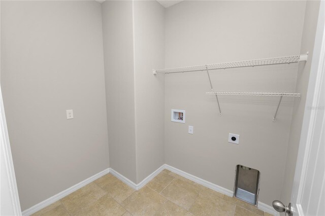 4125 Prima Lago Cir, Lakeland, FL 33810 - washroom with hookup for a washing machine, electric dryer hookup, and baseboards