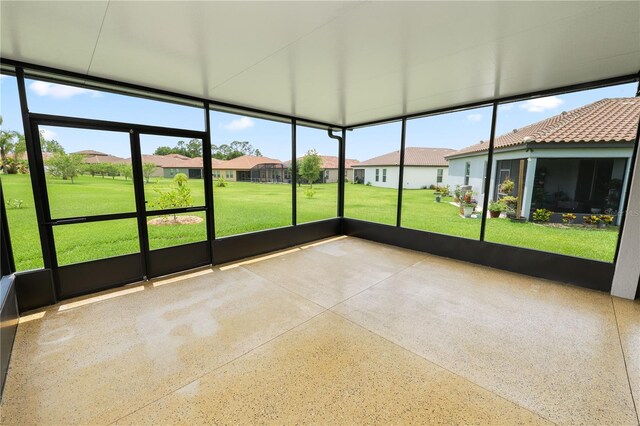 4125 Prima Lago Cir, Lakeland, FL 33810 - unfurnished sunroom featuring a residential view