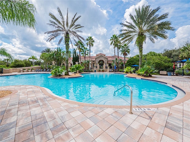 4125 Prima Lago Cir, Lakeland, FL 33810 - community pool featuring a patio