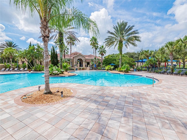 4125 Prima Lago Cir, Lakeland, FL 33810 - community pool featuring a patio