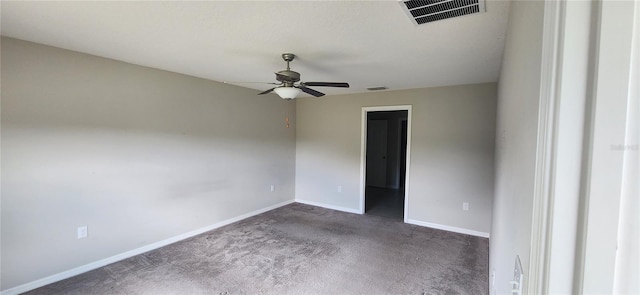 3188 Nubbin Ridge Ln, Zephyrhills, FL 33540 - empty room with ceiling fan, dark colored carpet, and baseboards