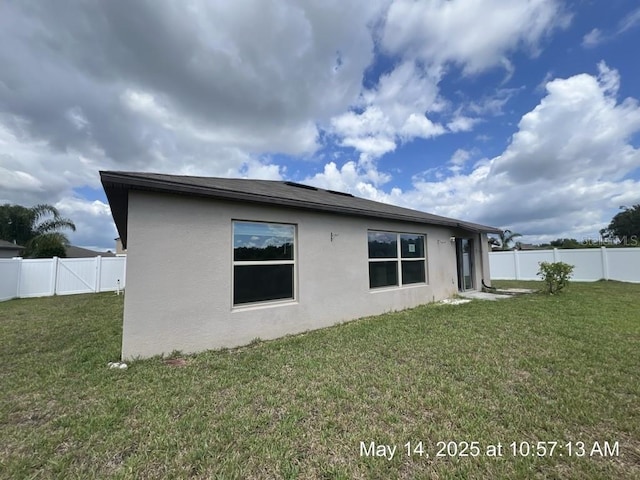 3188 Nubbin Ridge Ln, Zephyrhills, FL 33540 - view of property exterior featuring stucco siding