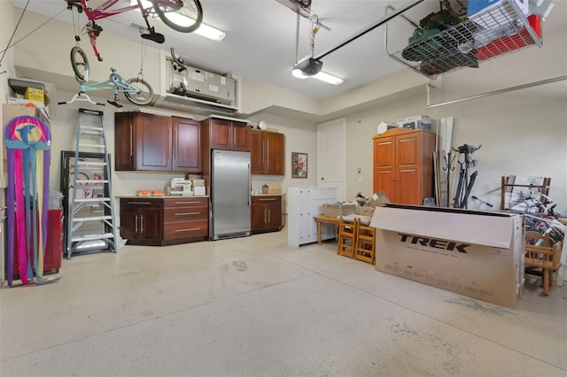 1825 Pawnee Trl, Lakeland, FL 33803 - garage with stainless steel refrigerator and a garage door opener
