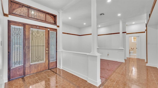 5370 Boxtree Ct, Dade City, FL 33523 - entryway with decorative columns, baseboards, and recessed lighting