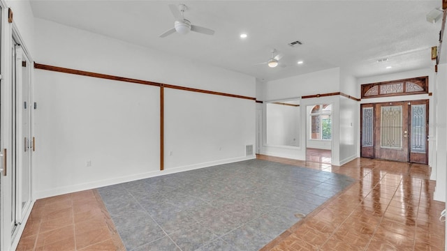 5370 Boxtree Ct, Dade City, FL 33523 - tiled empty room featuring ceiling fan, baseboards, and recessed lighting