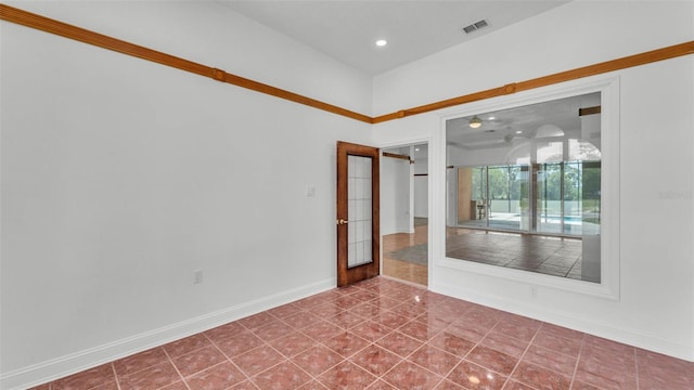 5370 Boxtree Ct, Dade City, FL 33523 - spare room with baseboards, tile patterned floors, and recessed lighting