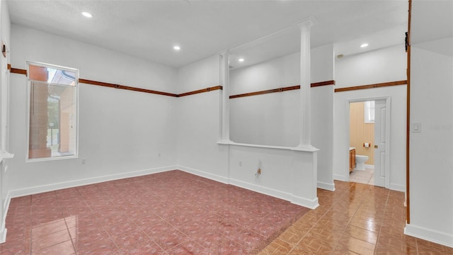 5370 Boxtree Ct, Dade City, FL 33523 - spare room with baseboards and recessed lighting