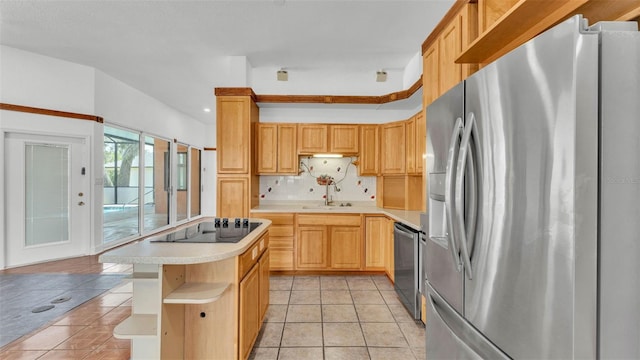 5370 Boxtree Ct, Dade City, FL 33523 - kitchen with stainless steel appliances, a sink, light tile patterned floors, light countertops, and decorative backsplash
