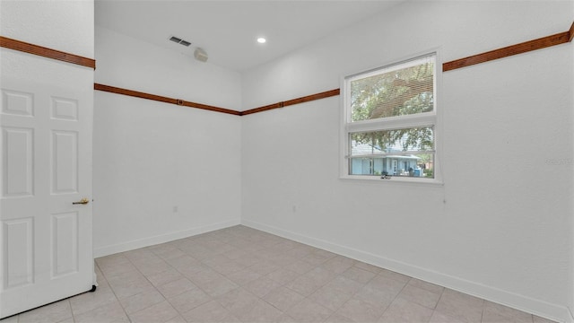 5370 Boxtree Ct, Dade City, FL 33523 - spare room featuring baseboards and recessed lighting