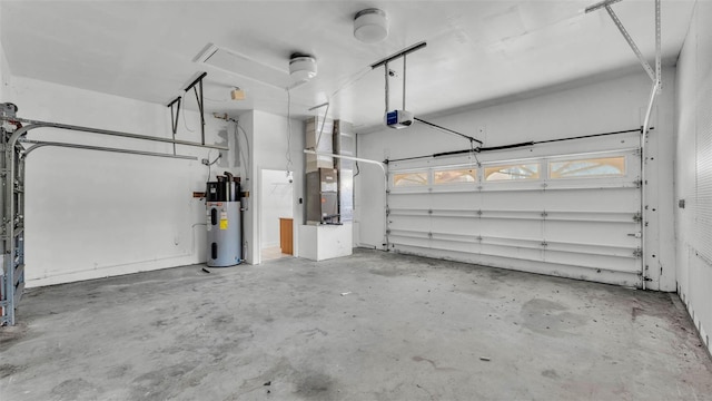 5370 Boxtree Ct, Dade City, FL 33523 - garage featuring a garage door opener, hybrid water heater, and heating unit