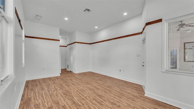 5370 Boxtree Ct, Dade City, FL 33523 - spare room featuring light wood-type flooring, recessed lighting, and baseboards