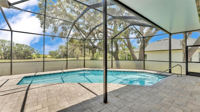 5370 Boxtree Ct, Dade City, FL 33523 - outdoor pool with a patio and glass enclosure