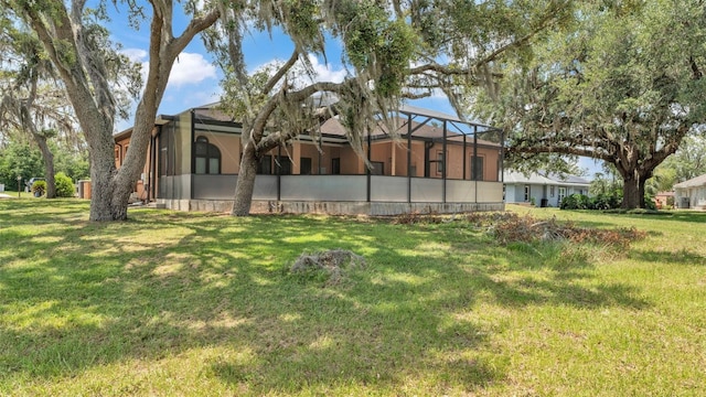 5370 Boxtree Ct, Dade City, FL 33523 - view of green lawn featuring a lanai