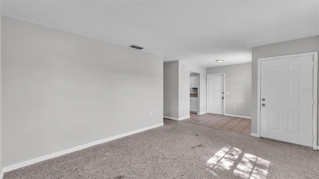 1017 Fleming Ave, Lakeland, FL 33815 - carpeted empty room featuring baseboards