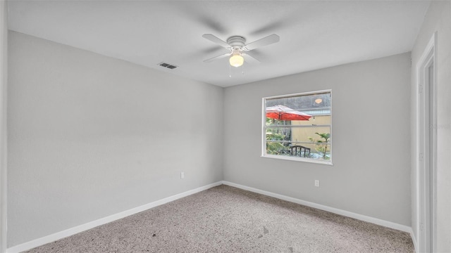 1017 Fleming Ave, Lakeland, FL 33815 - spare room with a ceiling fan, baseboards, and carpet flooring