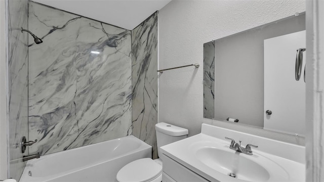 1017 Fleming Ave, Lakeland, FL 33815 - full bath with vanity, toilet, tub / shower combination, and a textured wall